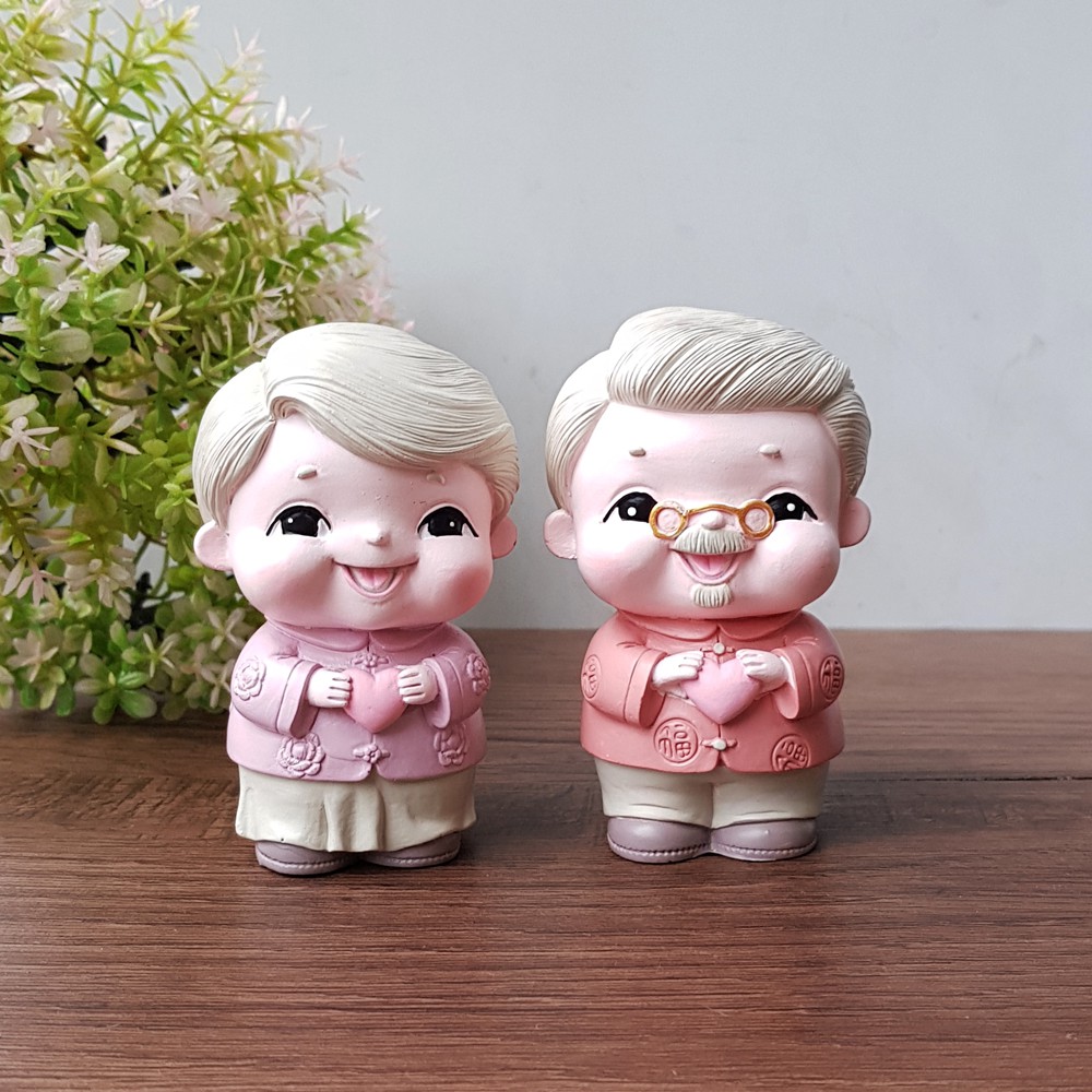 Bộ 02 tượng Ông Bà chibi kèm túi chữ Phát và chân đế tam cấp vuông nhỏ